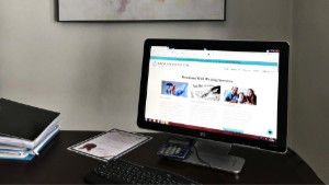 Raine Financial Photograph