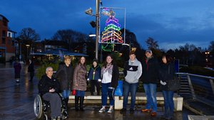 Harry Botting's 'Rainbow Christmas Tree and Shooting Star' installed in the Forum Photograph